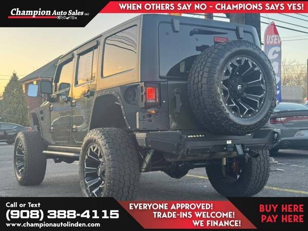 2015-jeep-wrangler-unlimited-4wdrubicon-4-wdrubicon-4-wdrubicon-223-champion-auto-sales-of-linden-big-1