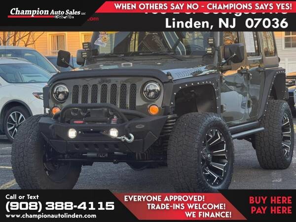 2015-jeep-wrangler-unlimited-4wdrubicon-4-wdrubicon-4-wdrubicon-223-champion-auto-sales-of-linden-big-0